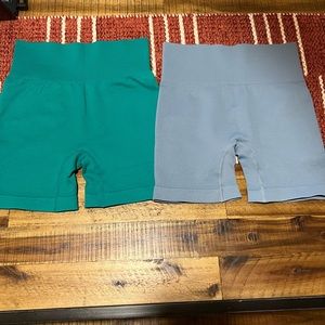 2 pairs of  nylon /spandex shorts size S green and baby blue NWOT